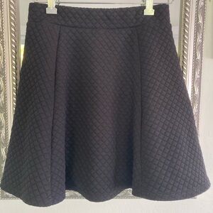 H&M black quilted skirt.
